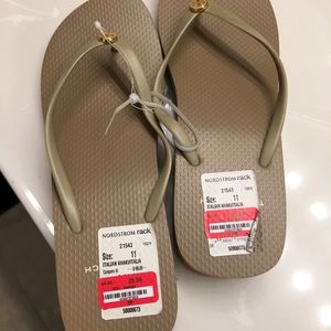Tory Burch  wedge flip flops price is firm